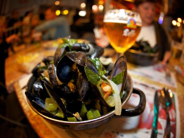 Platter of fried mussels and a beer