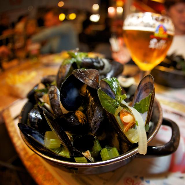 Platter of fried mussels and a beer